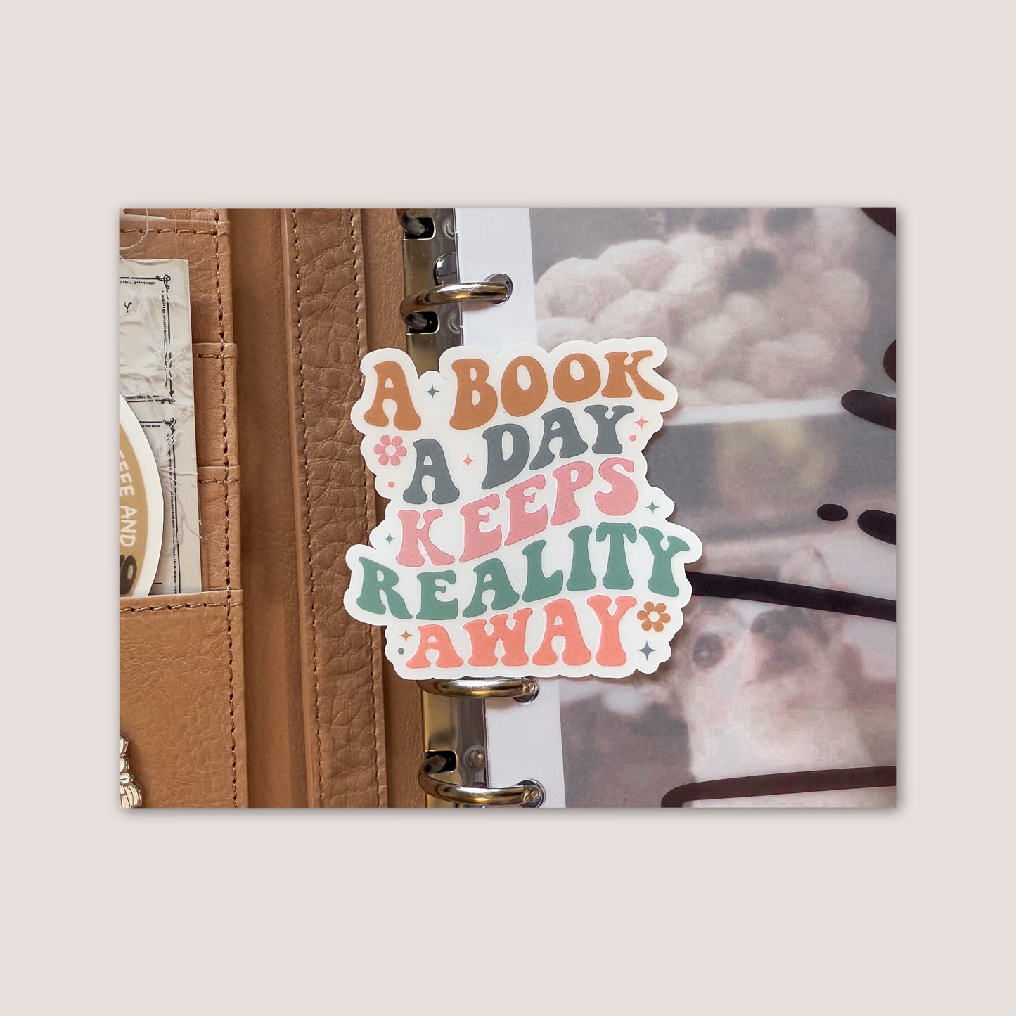 Matte vinyl die cut sticker | A book a day keeps reality away